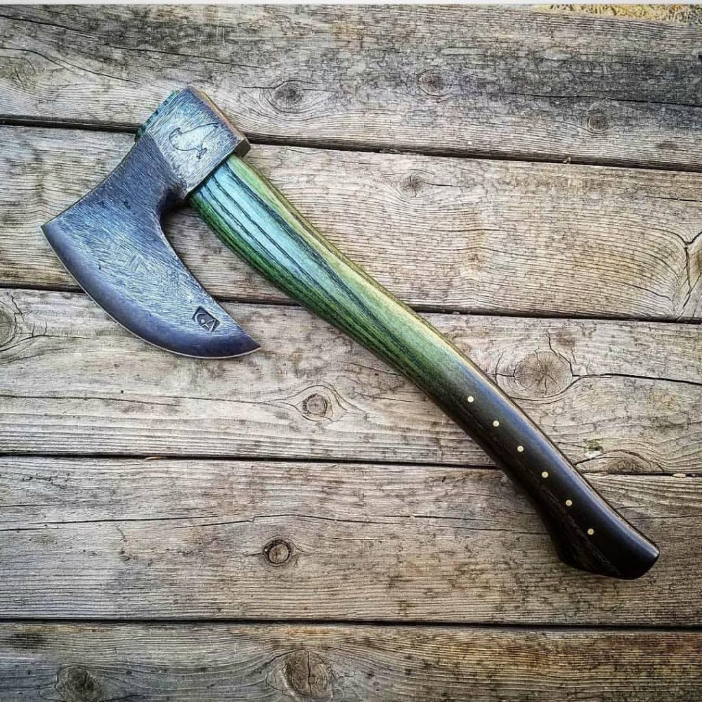 Raven Customs Hand Axe with a green handle.
